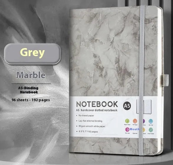 A5 skin-feel PU leather strap diary notebook open on horizontal line pages