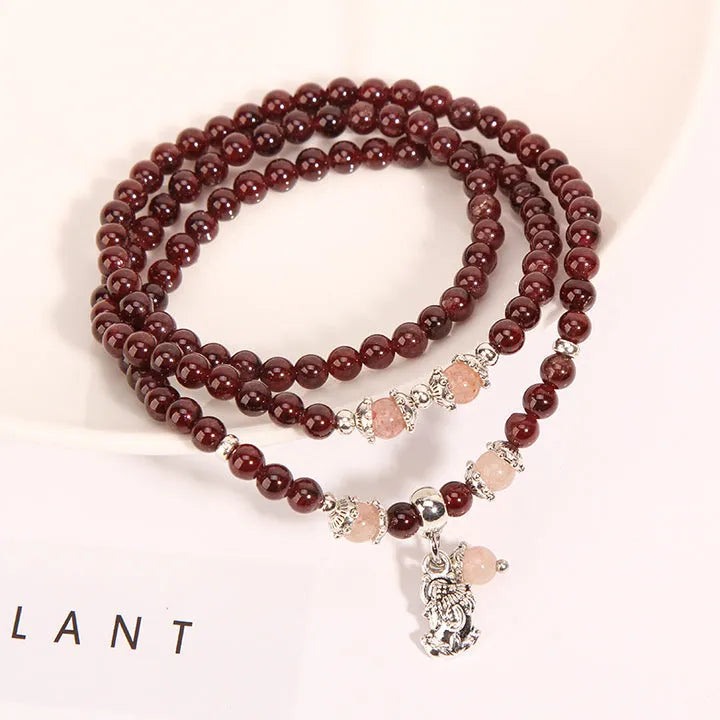 Wine red garnet crystal bracelet with flower-shaped beads in bohemian ethnic style