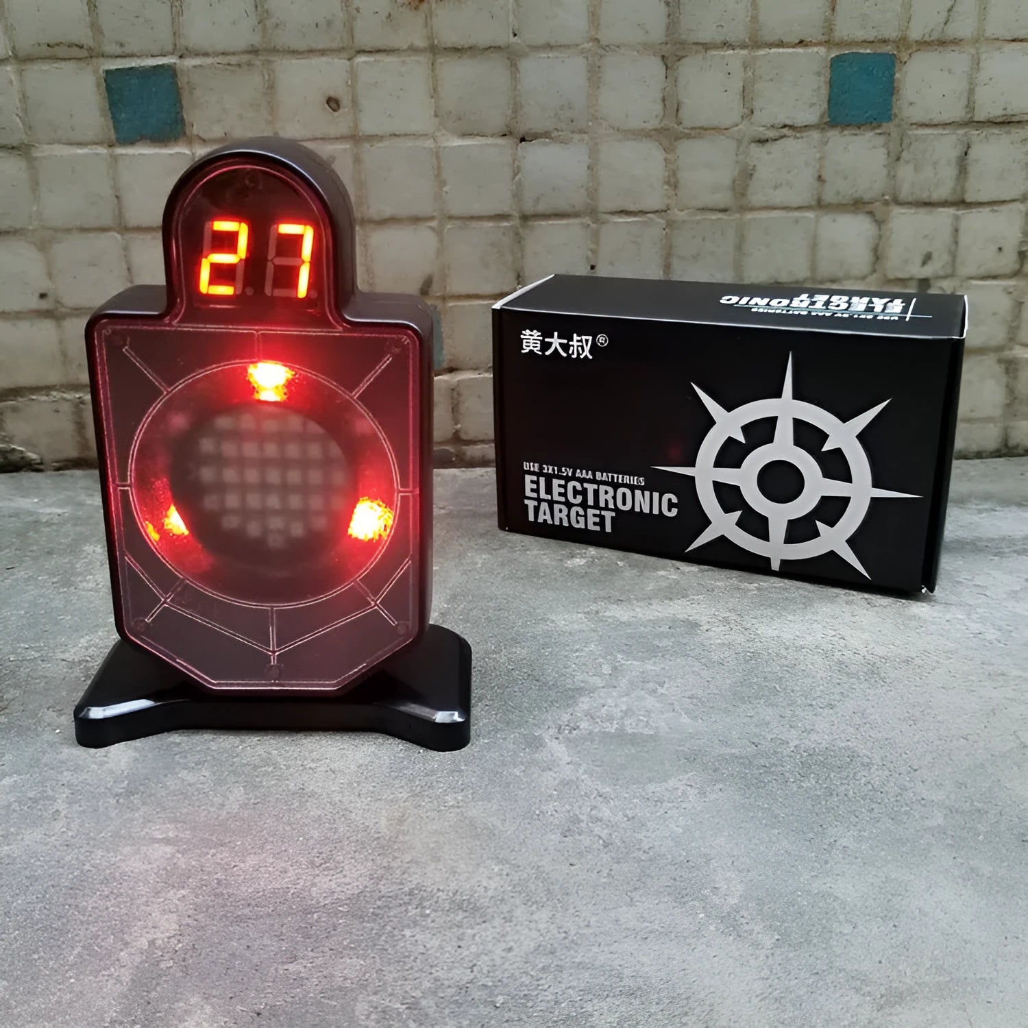 Plastic laser target with light and sound effects, dimensions 9 by 4.7 by 12.8 cm