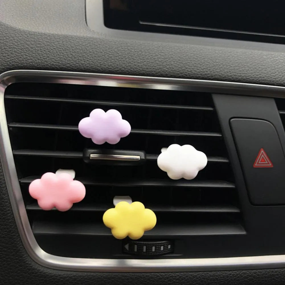 Baiyun cartoon resin car air vent fragrance clip in six colour options on a vent.