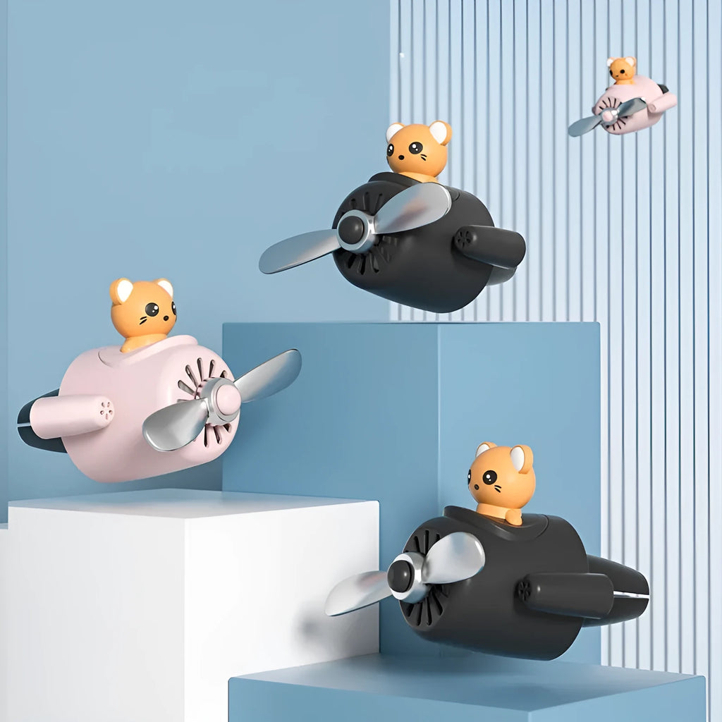 Cartoon aeroplane-shaped plastic clip for car air vent with fragrance pads