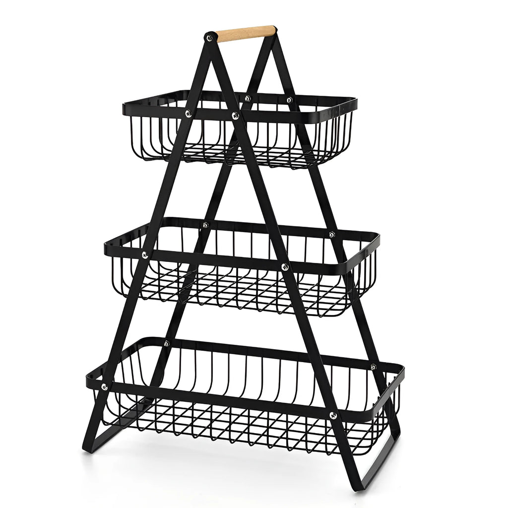 Black detachable iron double-layer fruit basket with a wooden handle on a kitchen counter.