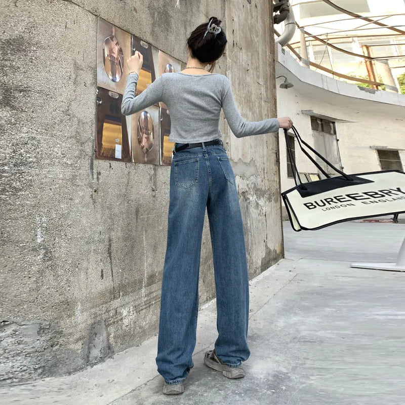Women's high-waisted retro blue straight-leg jeans on a neutral background