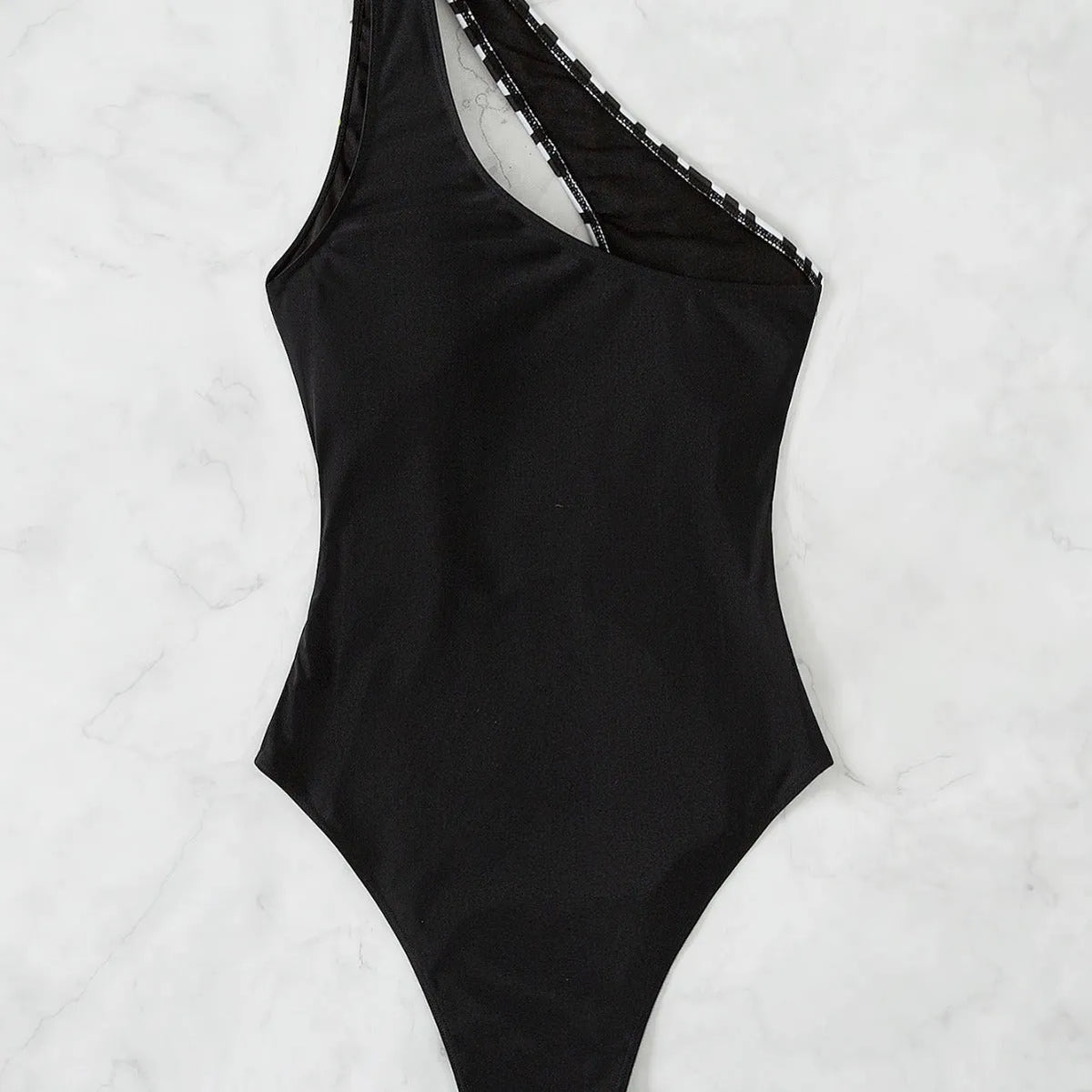 Women's one-piece swimsuit, single shoulder, zebra and plain black polyester patchwork, sleeveless