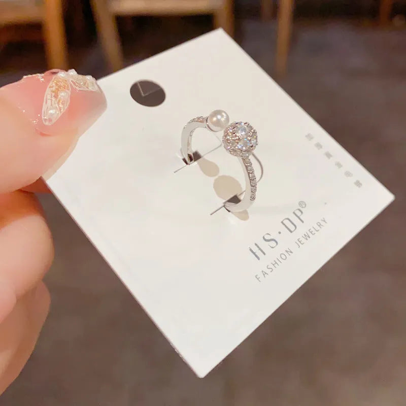 Adjustable open-end ring with round zircon pearl and thick gold plating in geometric design