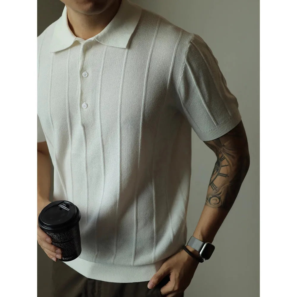 Men's loose fit solid colour t-shirt in black or white, made from polyester fabric.