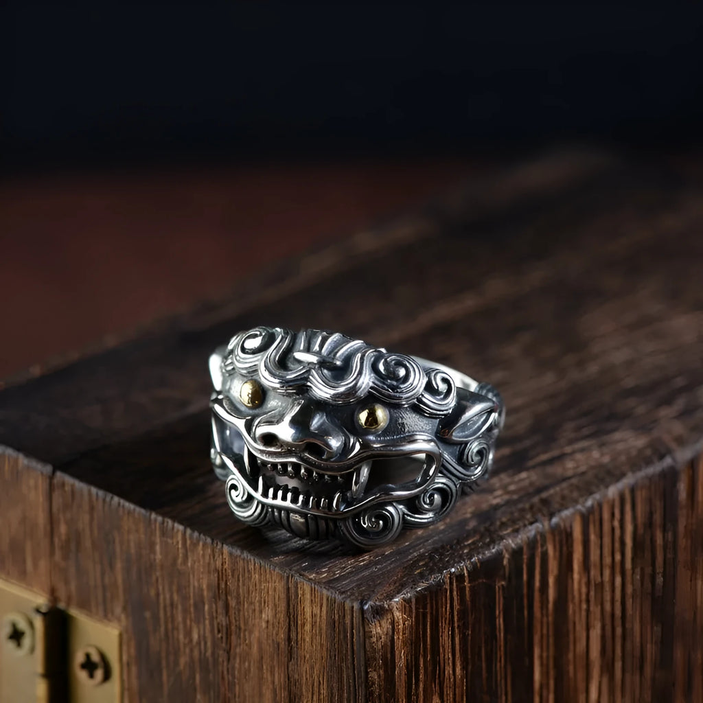 Silver open ring with a jibeast pattern, animal zodiac modelling, and a personalised diamond element.