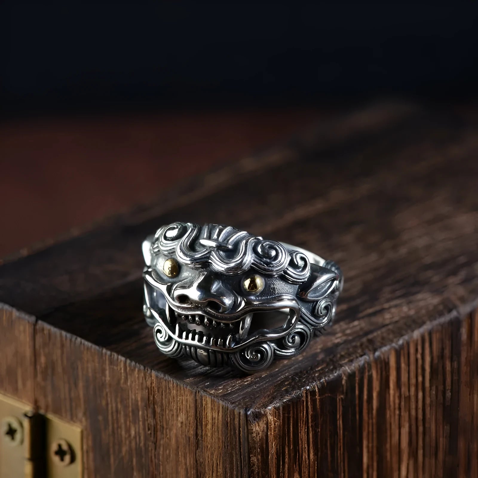 Silver open ring with a jibeast pattern, animal zodiac modelling, and a personalised diamond element.