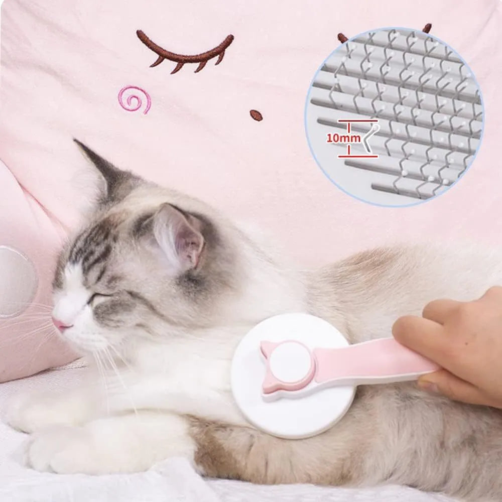 Blue self-cleaning cat brush with rubber-tipped metal pins and ergonomic handle for pet grooming