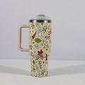 Red stainless steel travel tumbler with handle, straw and Christmas pattern decoration showing 1200ml capacity markings