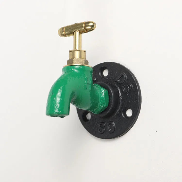 Metal water pipe style towel rack hook with polished chrome finish mounted on wall