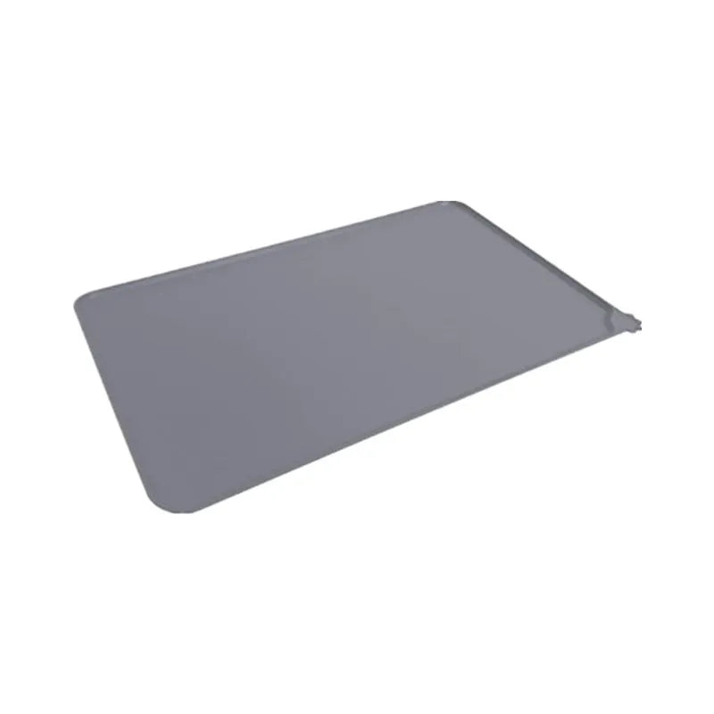 Silicone pet placemat in five colour options beneath dog food and water bowls