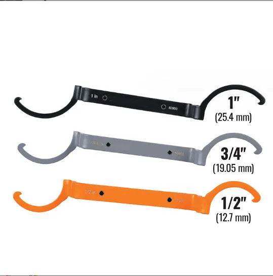 Three colour-coded wrenches in orange, grey and black showing crescent, magnetic and catheter locking designs