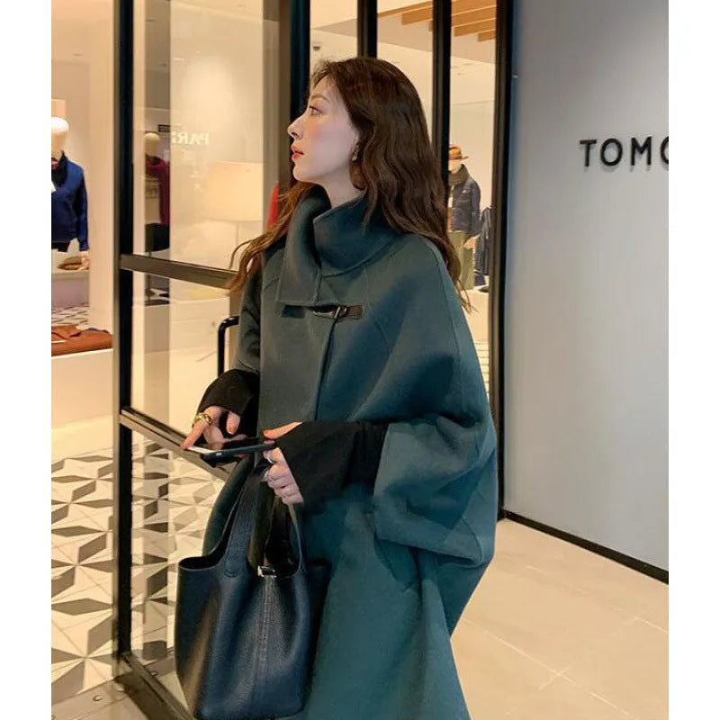 Women's Korean style coat with flight sleeves and half sleeve length in oatmeal colour