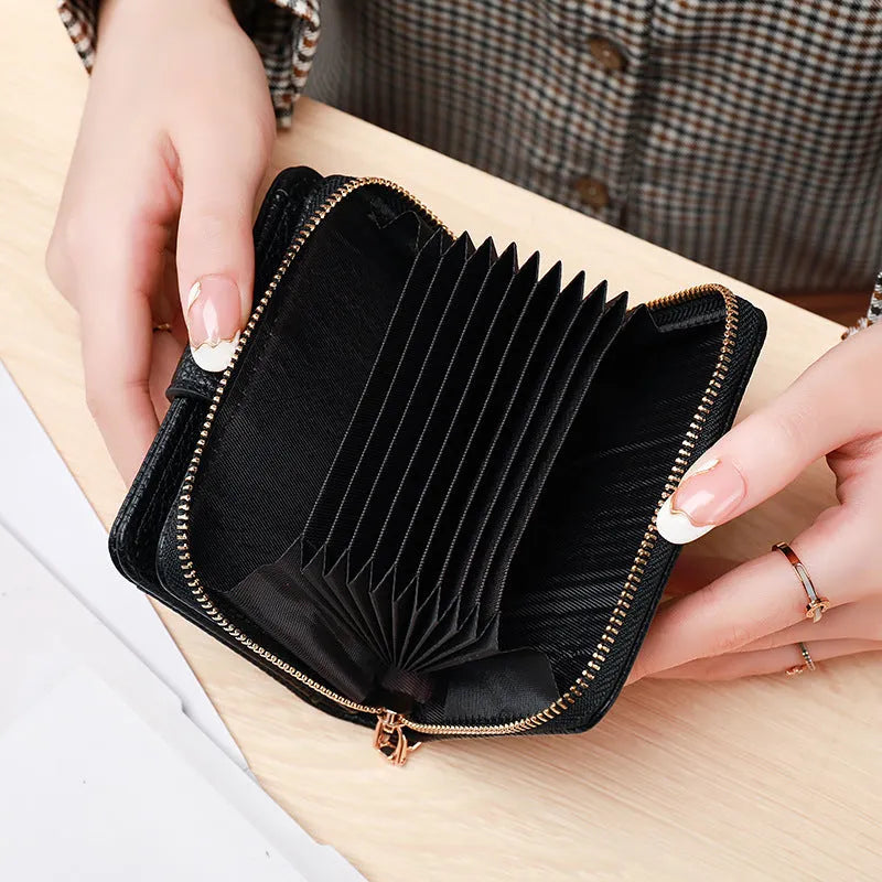 Ladies short wallet with lychee pattern in synthetic pu leather showing 2-fold design