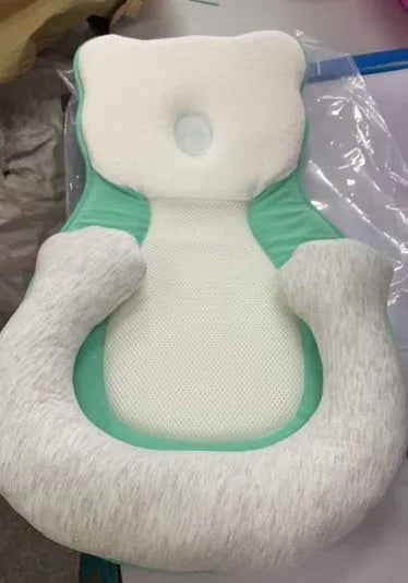 Portable baby flat sleep pillow with soft cotton surface in multiple colour options on a neutral background.