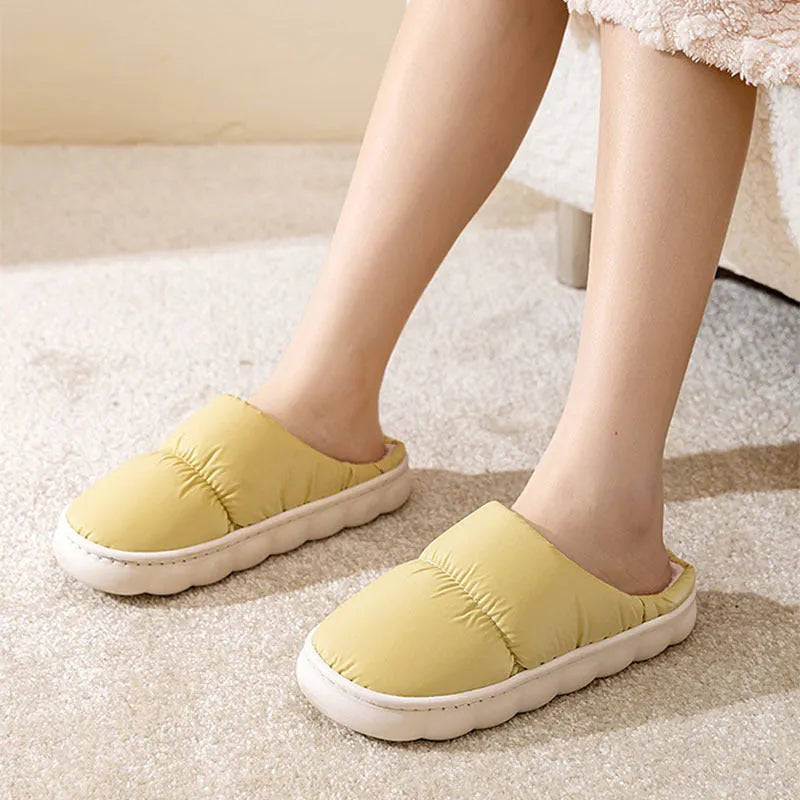 Blue down cotton slippers with artificial leather uppers, thick rubber soles, and plush lining for indoor winter wear.