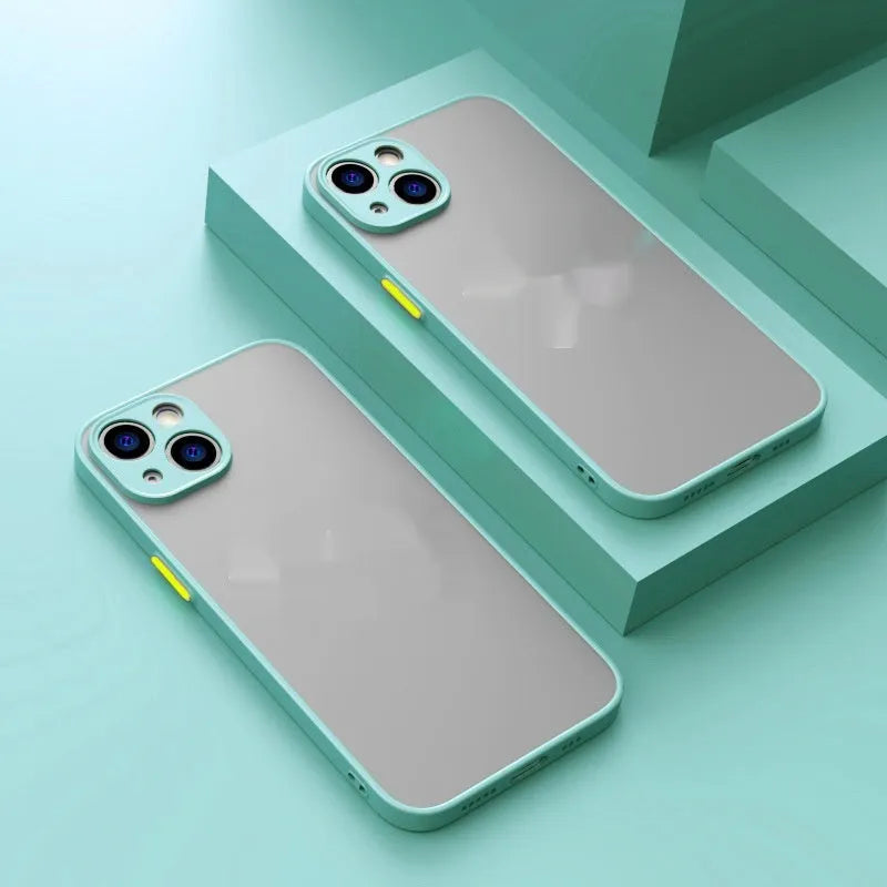 Frosted finish magnetic iPhone case shown in multiple colours on a table next to a phone