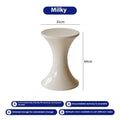 Plastic hourglass-shaped shoe changing stool shown in a selected colour.