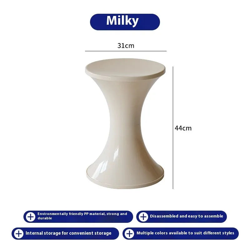 Plastic hourglass-shaped shoe changing stool shown in a selected colour.