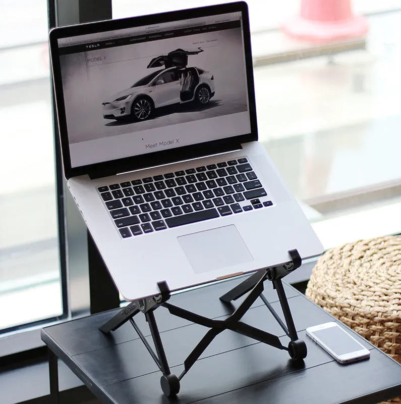 Sagacious black portable laptop stand with foldable enhanced nylon construction and storage bag