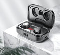 Black Bluetooth gaming headset with charging case showing earpieces and accessories
