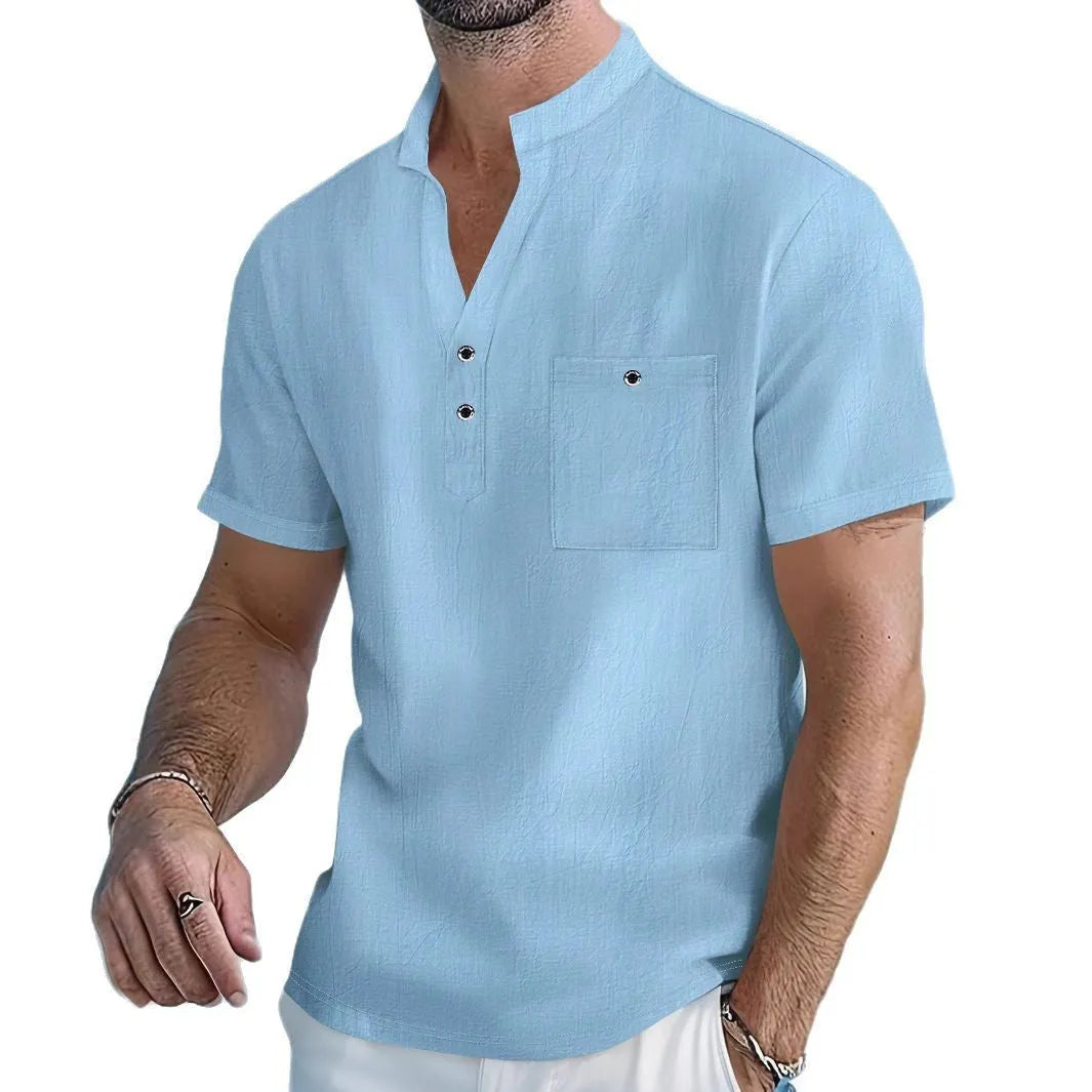 Men's loose fit linen T-shirt with a stand collar and short sleeves in a light blue colour.
