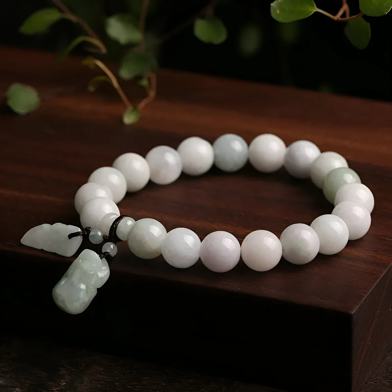 Natural jade bracelet with a choice of hanging charms: apple, double apple, money bag, gourd, or Maitreya Buddha.