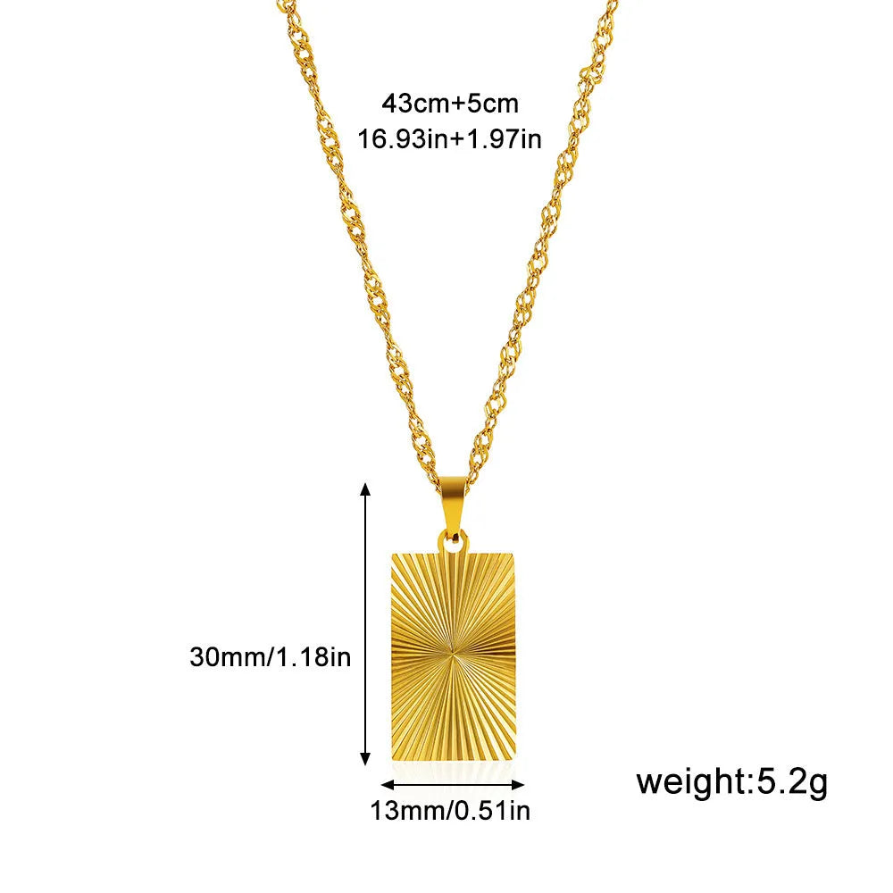 Gold-plated stainless steel necklace with pleated round pendant on water wave chain