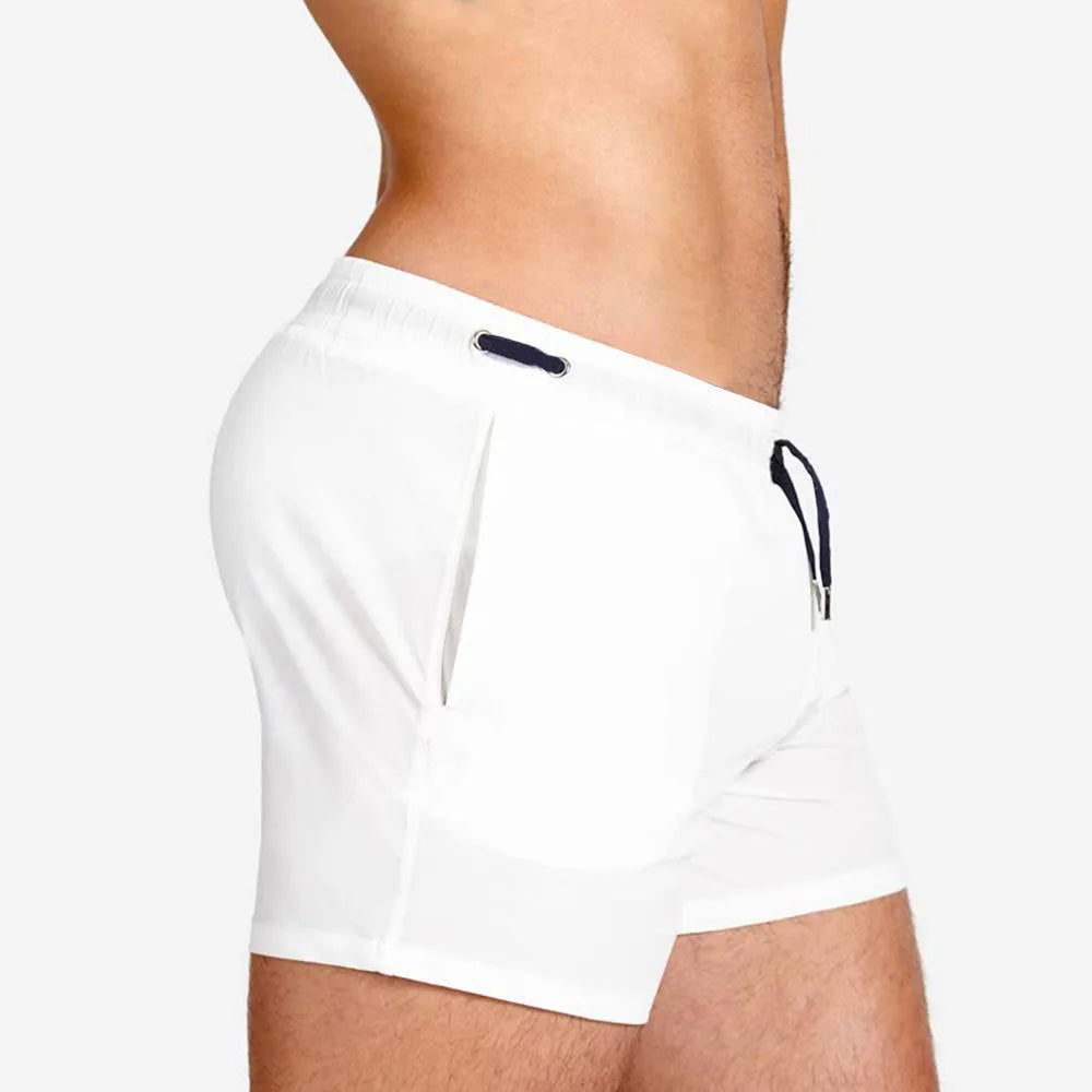 Men's solid colour polyester sports shorts with mesh lining in army green