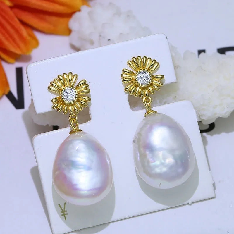 S925 sterling silver baroque flower drop earrings and matching ring holder set on a plain background.
