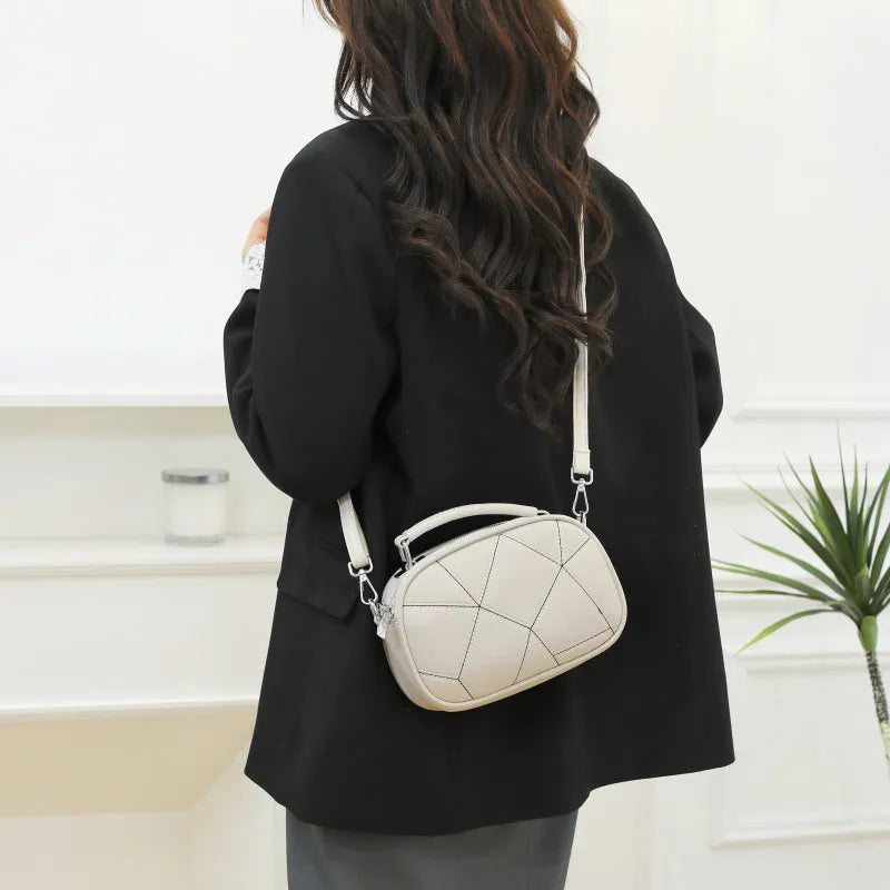 Round grey retro patchwork small bag with visible stitching, 20x15 cm size.