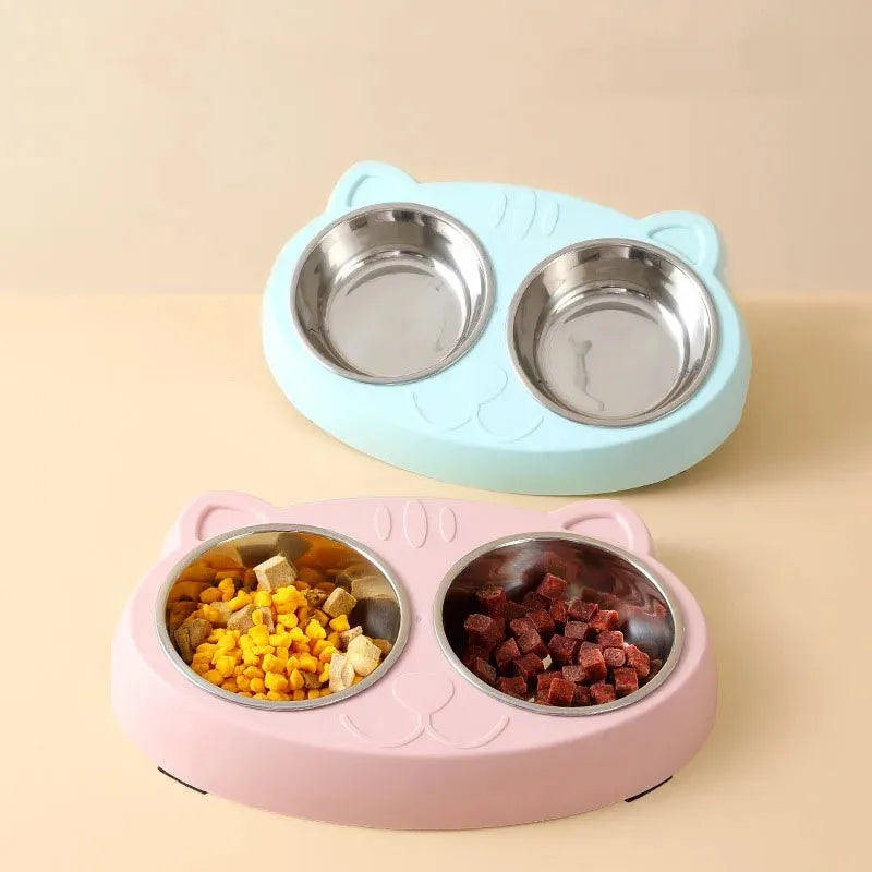 Macaron coloured plastic pet feeder tray with two bowls and a non-slip base.