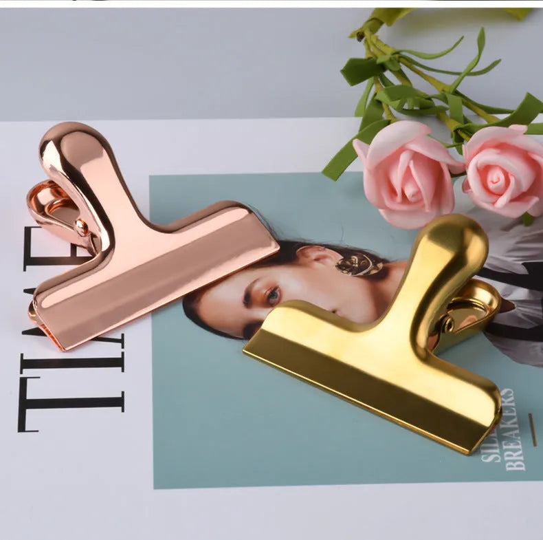 Gold stainless steel dovetail clip on white paper, 7.6x6cm, 430 steel, vacuum-plated finish