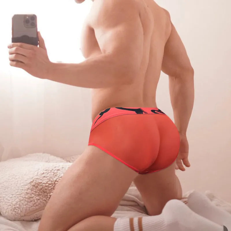 Men's solid colour cotton boxer shorts with low waist and modal net fabric detail