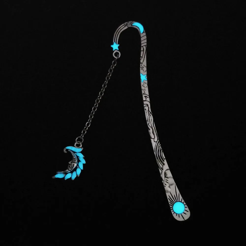 Retro five-pointed star glowing metal bookmark in ancient silver and bronze colours with celestial patterns