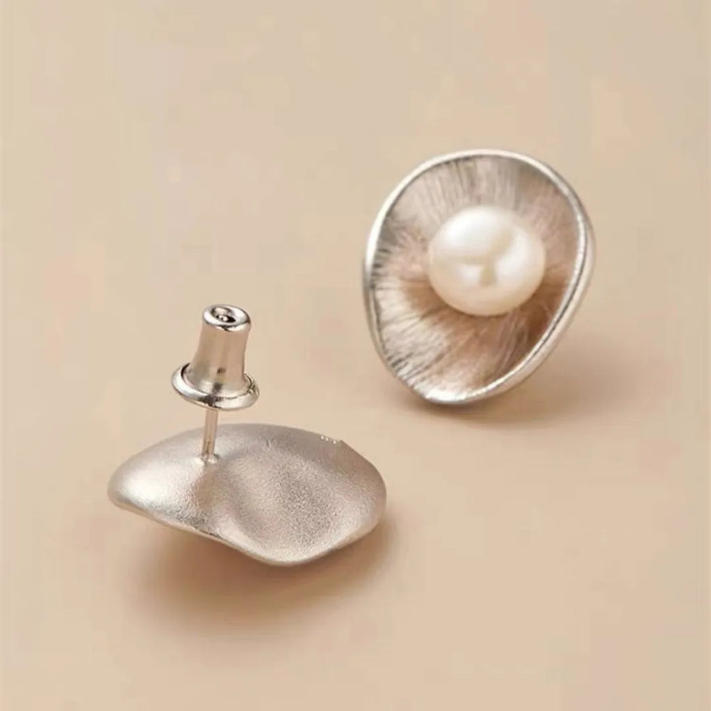 Pearl sterling silver geometric ear studs with gold electroplating and needle post fastenings