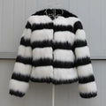 Women's black and white striped faux fur leather jacket with regular sleeves.