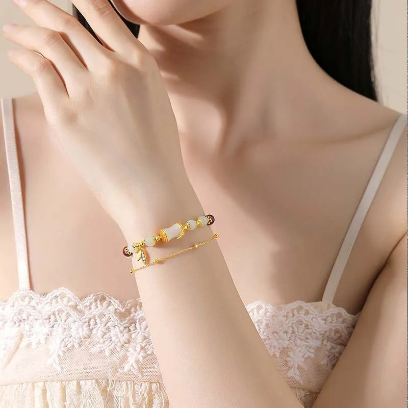 Retro bamboo design bracelet with flower shape and Ruyi elements in coloured glaze construction