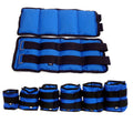 A pair of Oxford cloth legging sandbags for athletic training, shown with weight options from 1kg to 6kg.