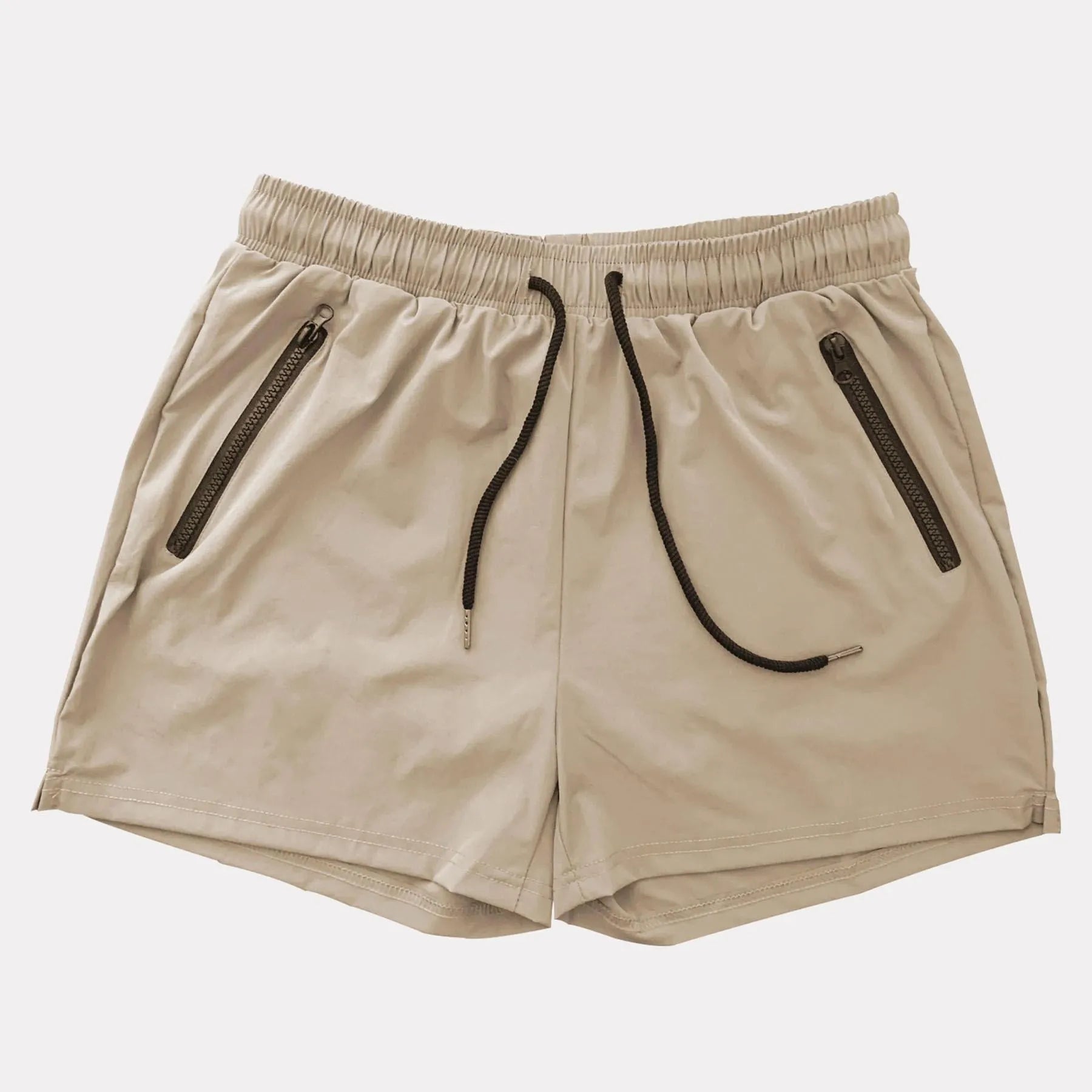 Man wearing blue mid-waist polyester sports shorts on a casual summer day.
