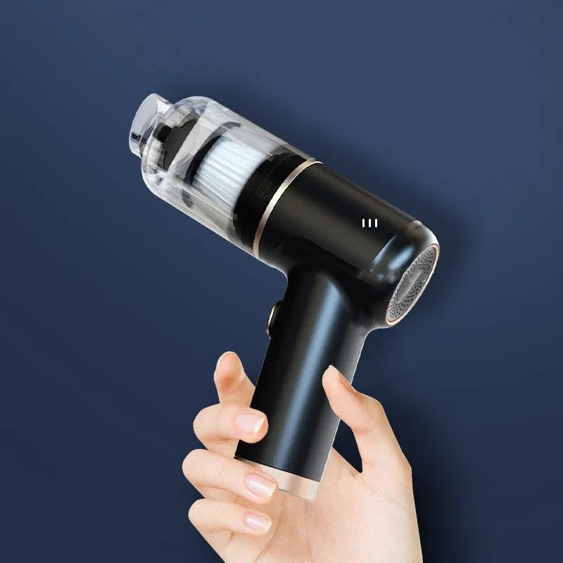 Black wireless handheld car vacuum cleaner and inflator with multiple nozzle attachments