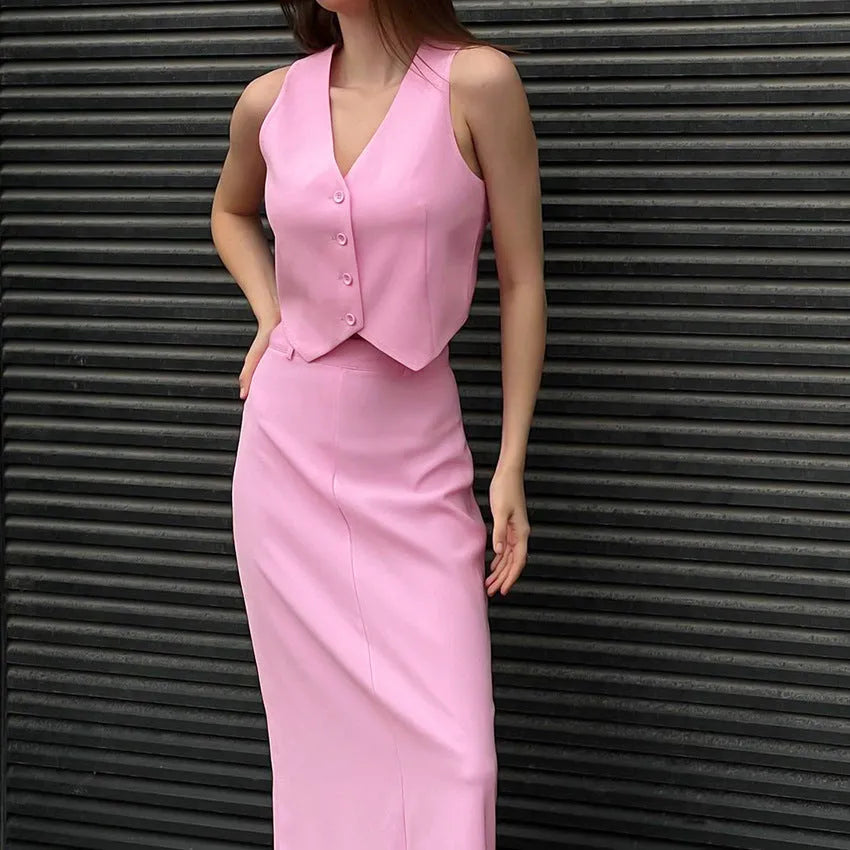 Pink polyester sleeveless vest and long split skirt suit for women