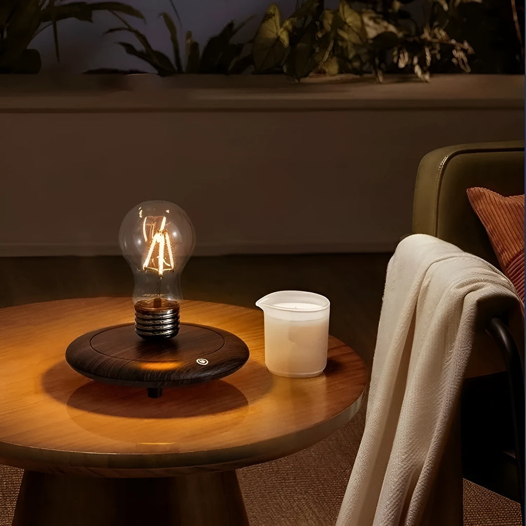Suspended bulb creative night lamp with wooden base on desktop