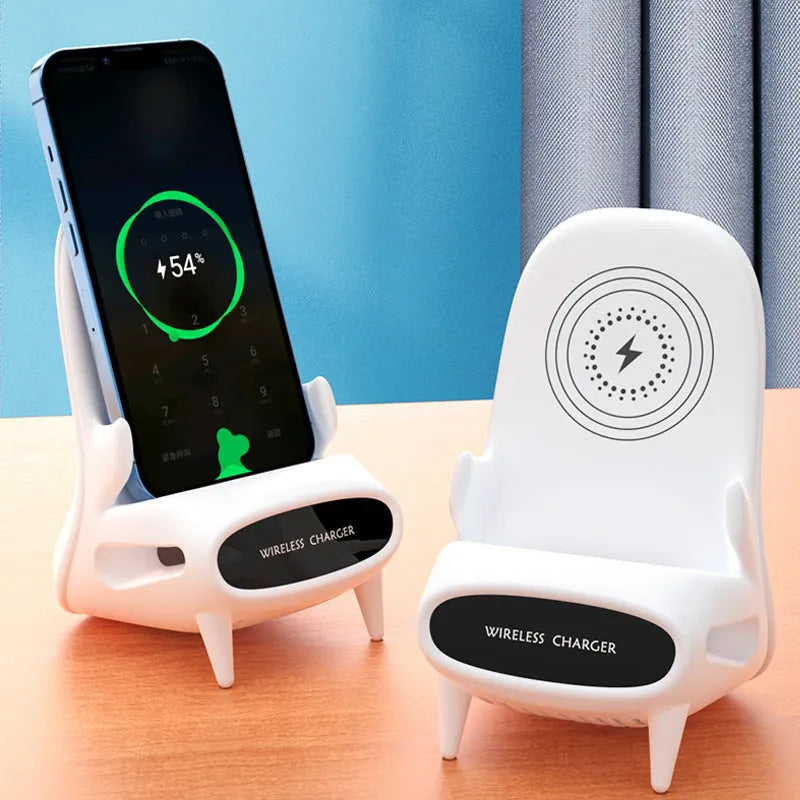 White mini chair-shaped wireless phone charger and holder on a desk