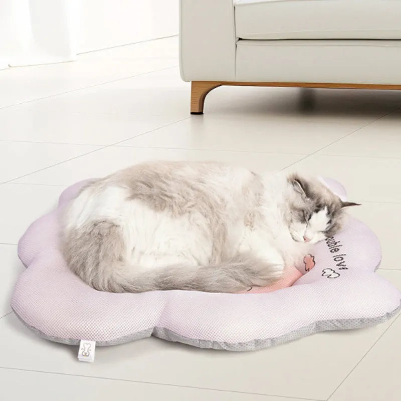Ice silk pet cooling mat in green colour showing size options for dogs and cats