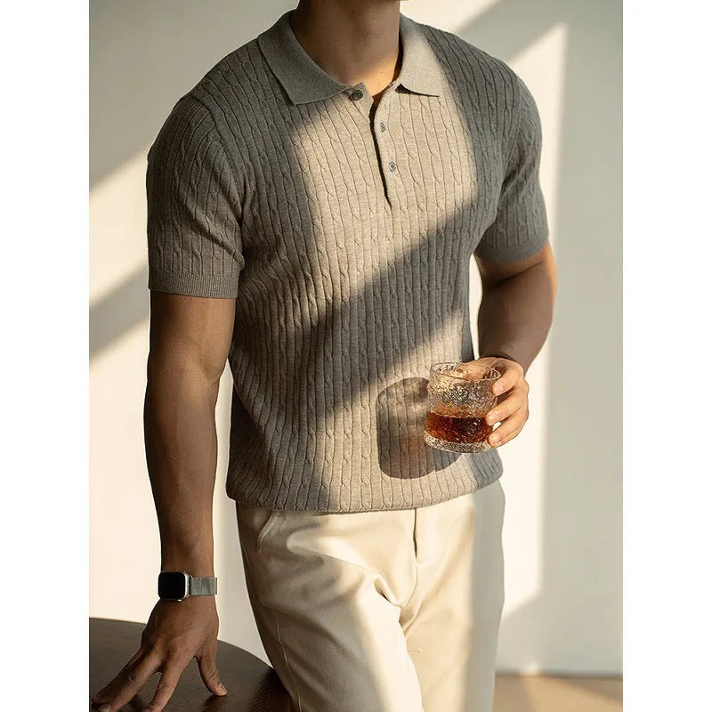 Man wearing a khaki short-sleeve business casual top, showing slim fit and fabric texture.