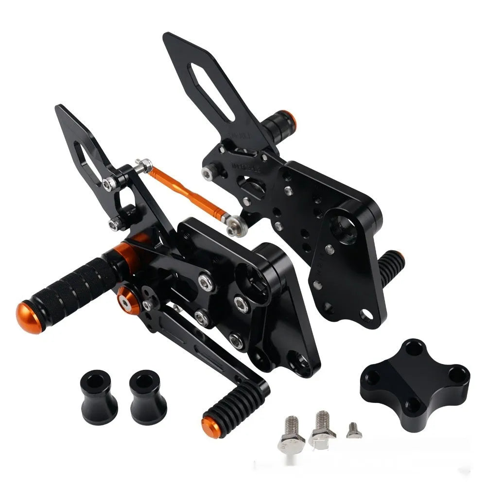 KTM Duke motorcycle pedal support assembly in black and orange for 125 200 250 390 models