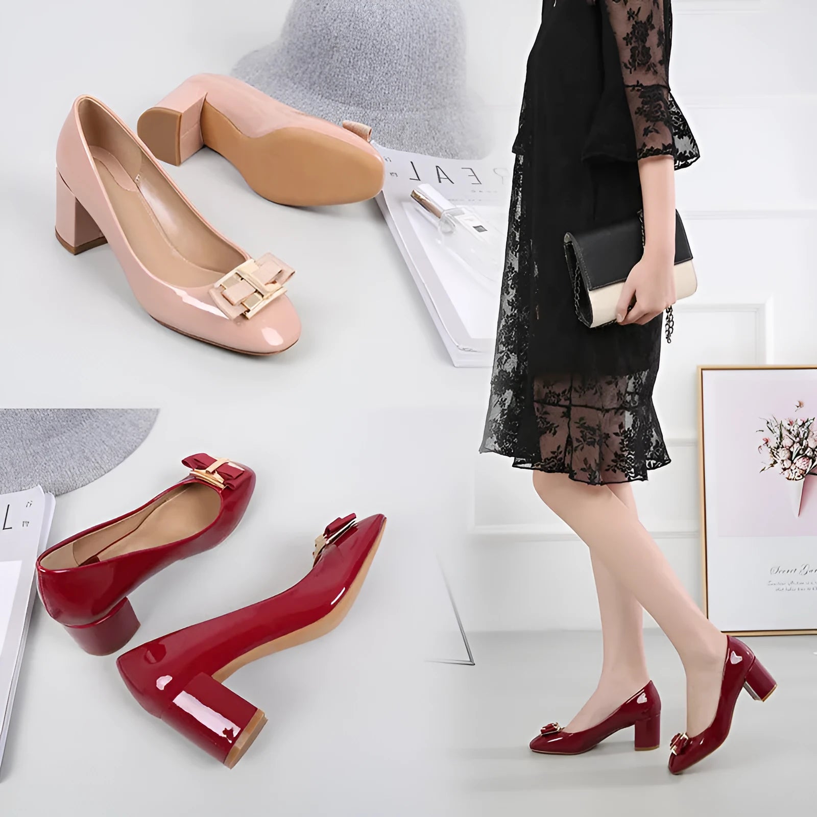 Mid heel round toe chunky heel pumps in solid colour with work buckle detail on a white background