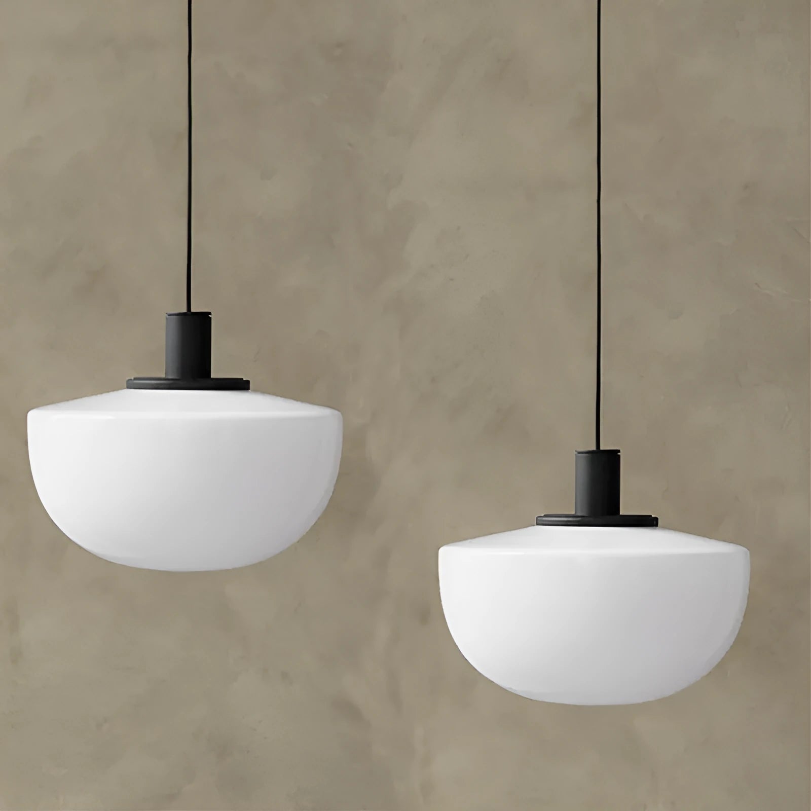 Simple modern milky white glass single-head pendant light suspended from ceiling